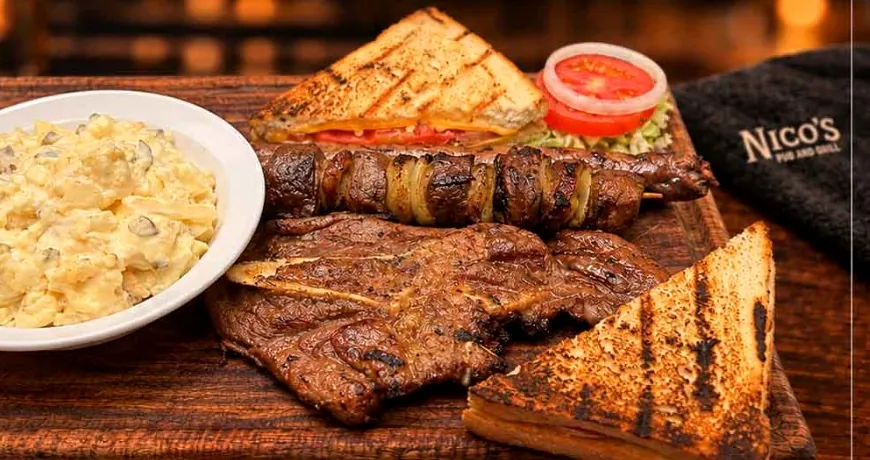 A braai plate from Nico’s: steak, sosatie, potato salad and roosterkoek