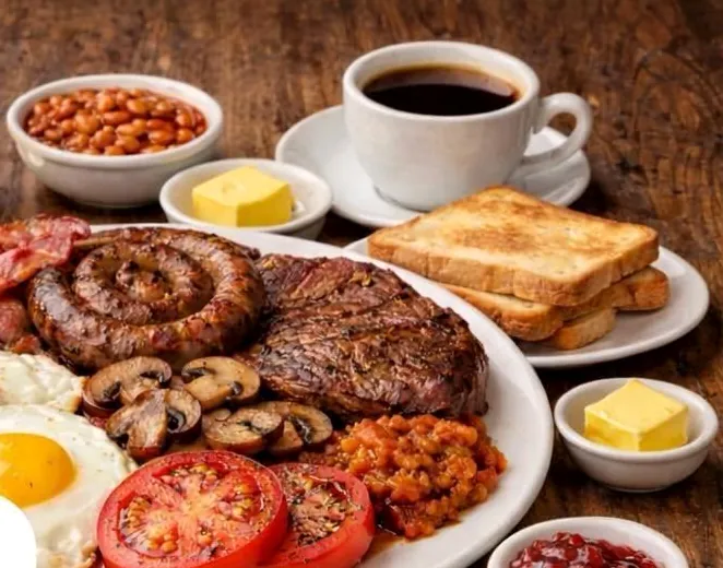 Nico’s breakfast plate: boerewors, steak, eggs, mushrooms, tomato, beans and toast